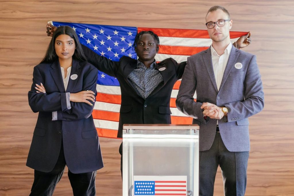candidate holding American flag behind a lectern